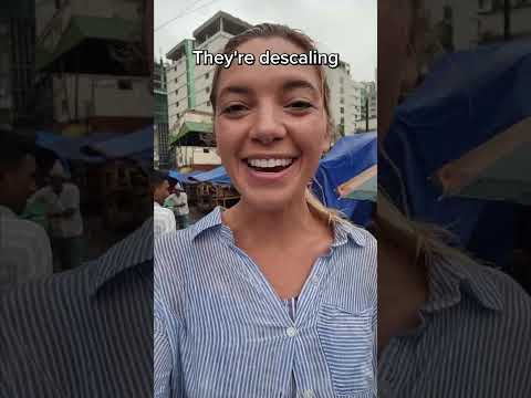 Stuck in the rain at a Bangladesh market #bangladesh #dailyvlogs #travelcouples #everycountry